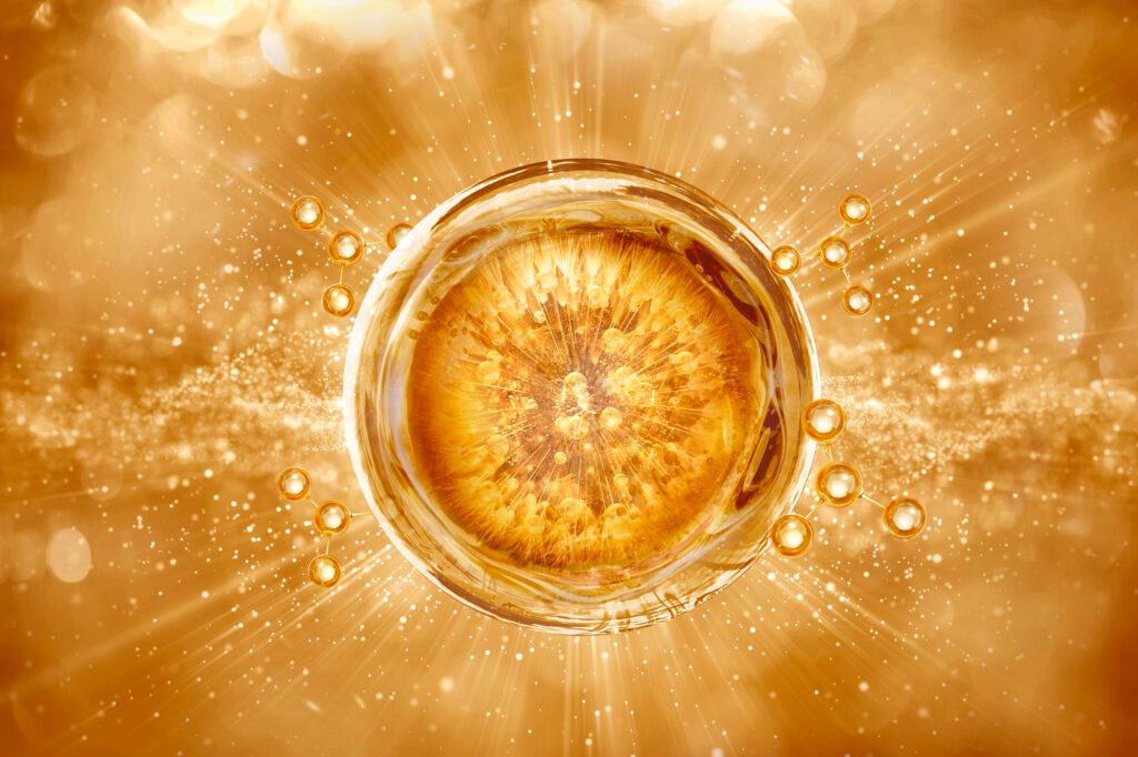 Representación científica de la vitamina E como molécula antioxidante en fondo dorado brillante